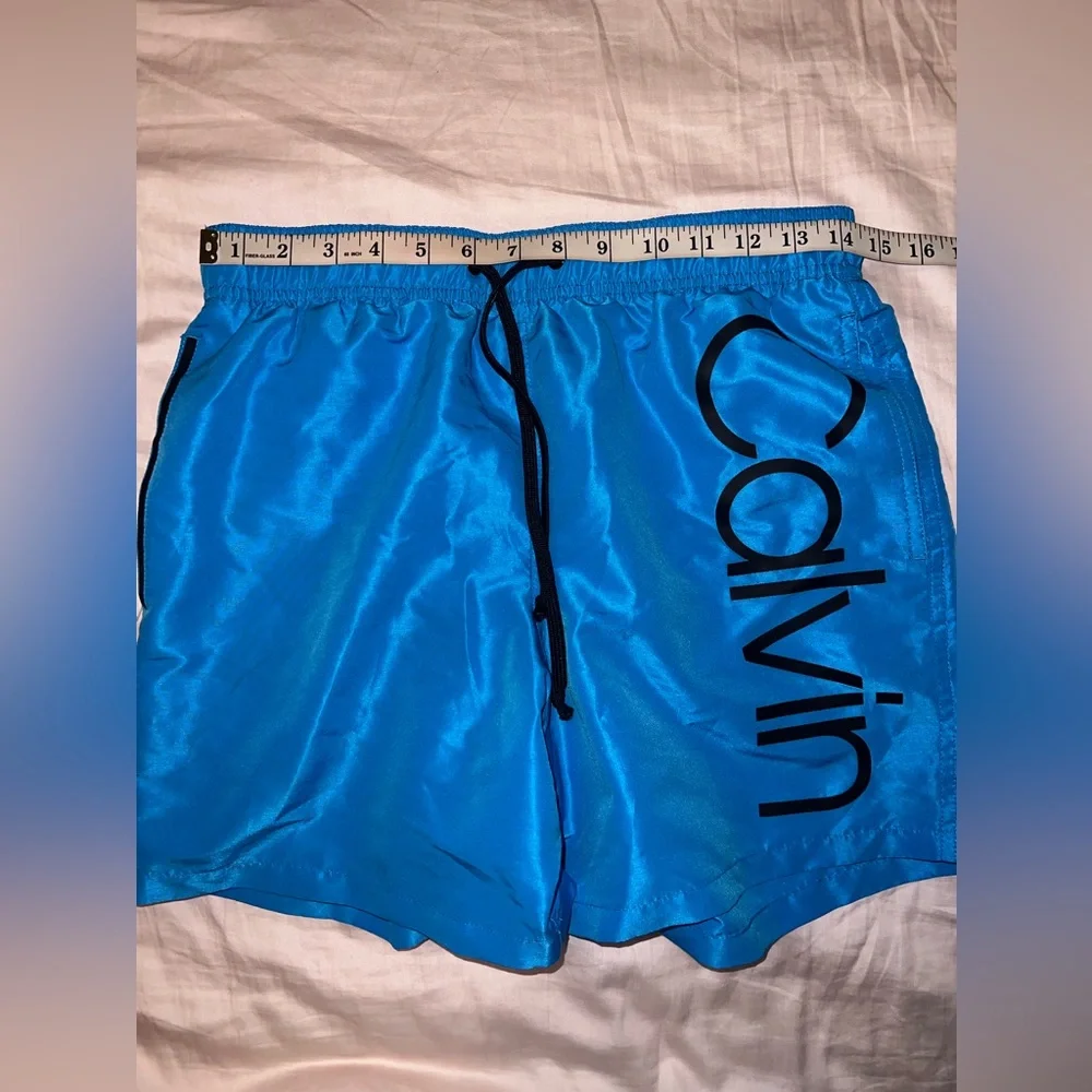 Calvin Klein Men’s Light Blue Lined Swim Trunks Size S